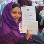 Ms Najma with her Teacher's Award